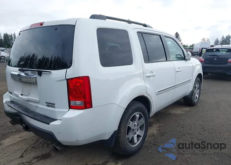 2010 Honda Pilot Touring z USA, uszkodzony, nr VIN 5FNYF4H92AB031653